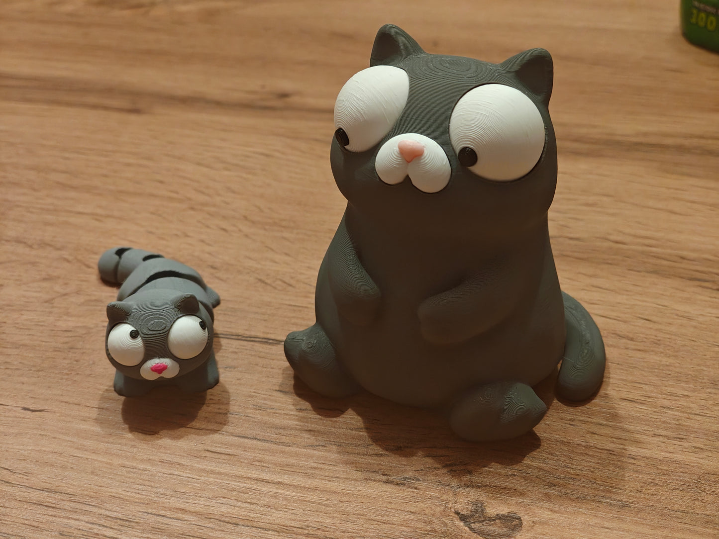 Mini Goofy Cat flexi figure with movable googly eyes, close-up on white background