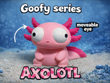 Goofy axolotl figure with large movable googly eyes, front view on white background