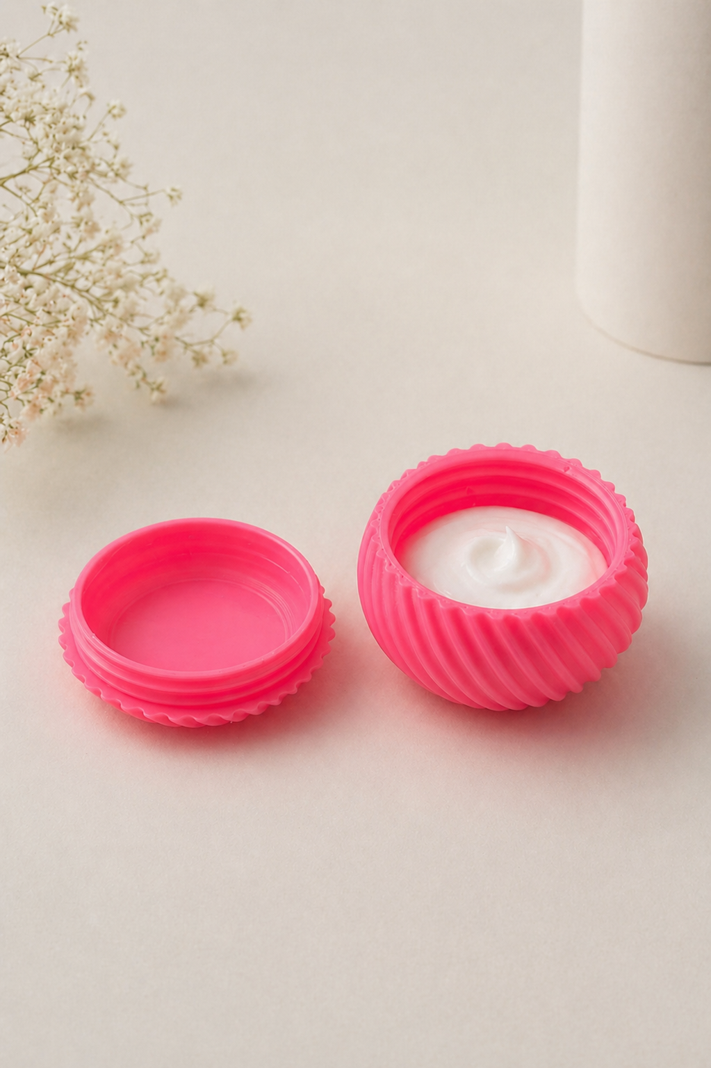 Collection of nine colorful mini storage jars arranged to display full color range available