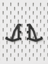 Close-up of three-prong attachment hook securely gripping mechanical keyboard frame