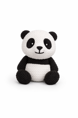 Side profile view of panda figure displayed on a wooden shelf