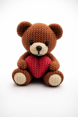 Teddy bear displayed on shelf as home decor with matte natural finish