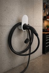 White wall-mounted Type 2 EV charging cable holder with black connector socket