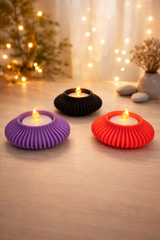 Black 3D-printed tea light holder with 8cm diameter and elegant grooved design