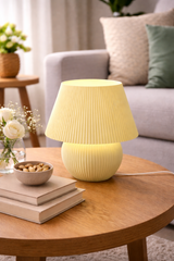 Side view showing lamp positioned on desk with USB power cable