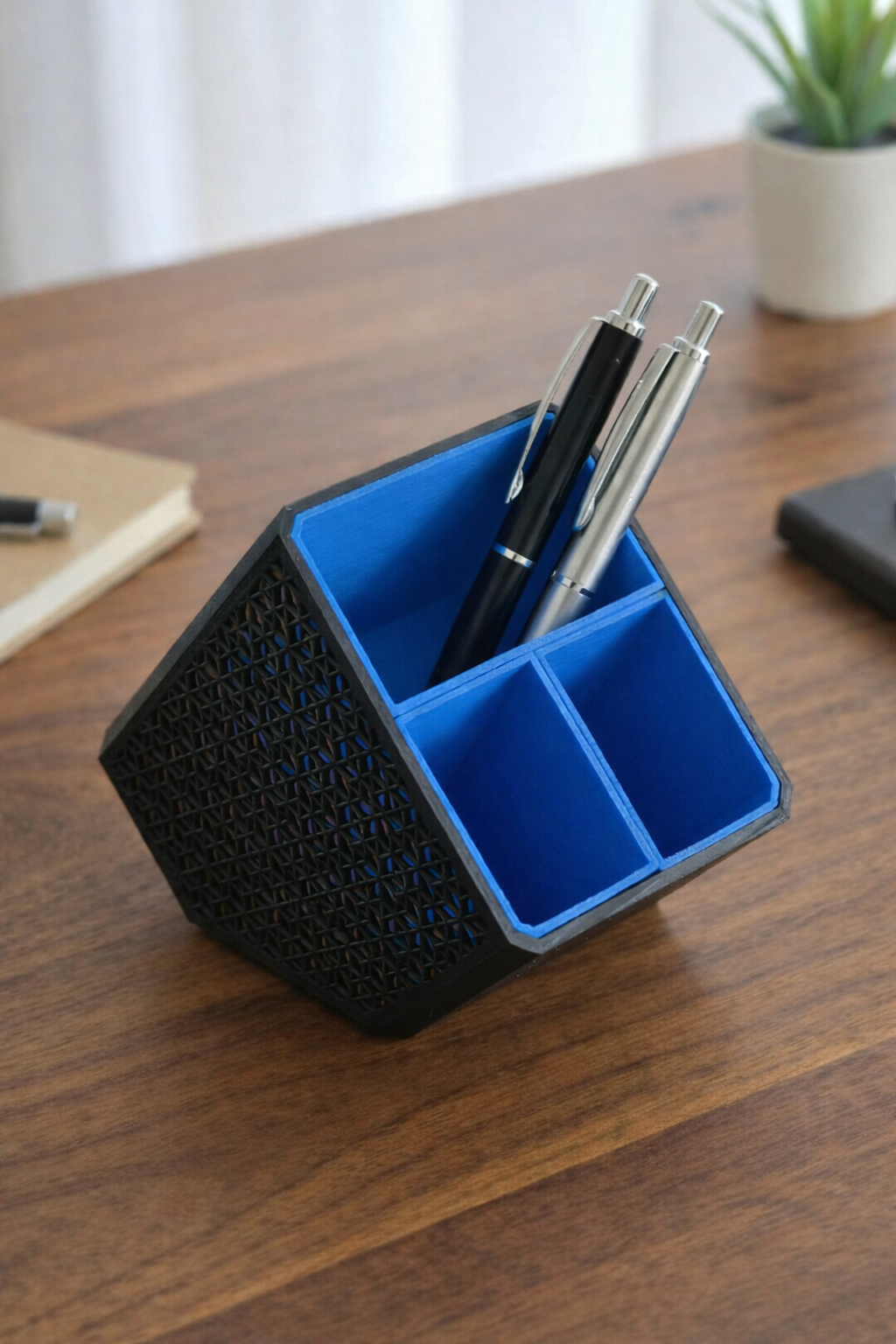 Close-up detail of wooden compartments organizing pens, pencils, and office supplies