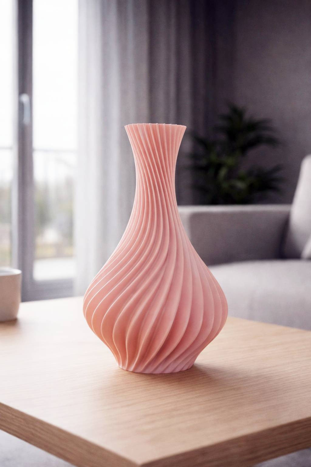 Elegant pink spiral vase 20cm tall with modern twisted ribbed design