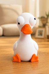 Goofy goose figure with large movable googly eyes on a white background