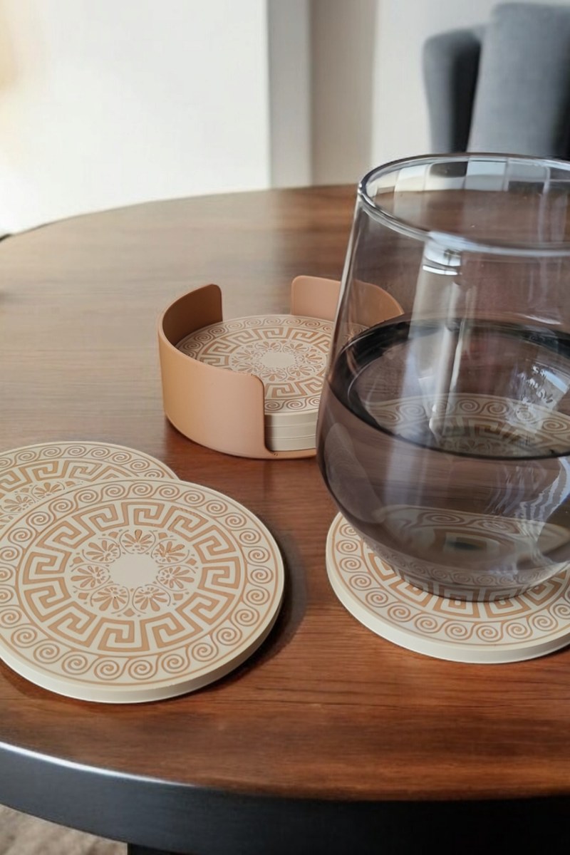 Close-up of Greek ornamental pattern on single coaster with multicolored geometric design