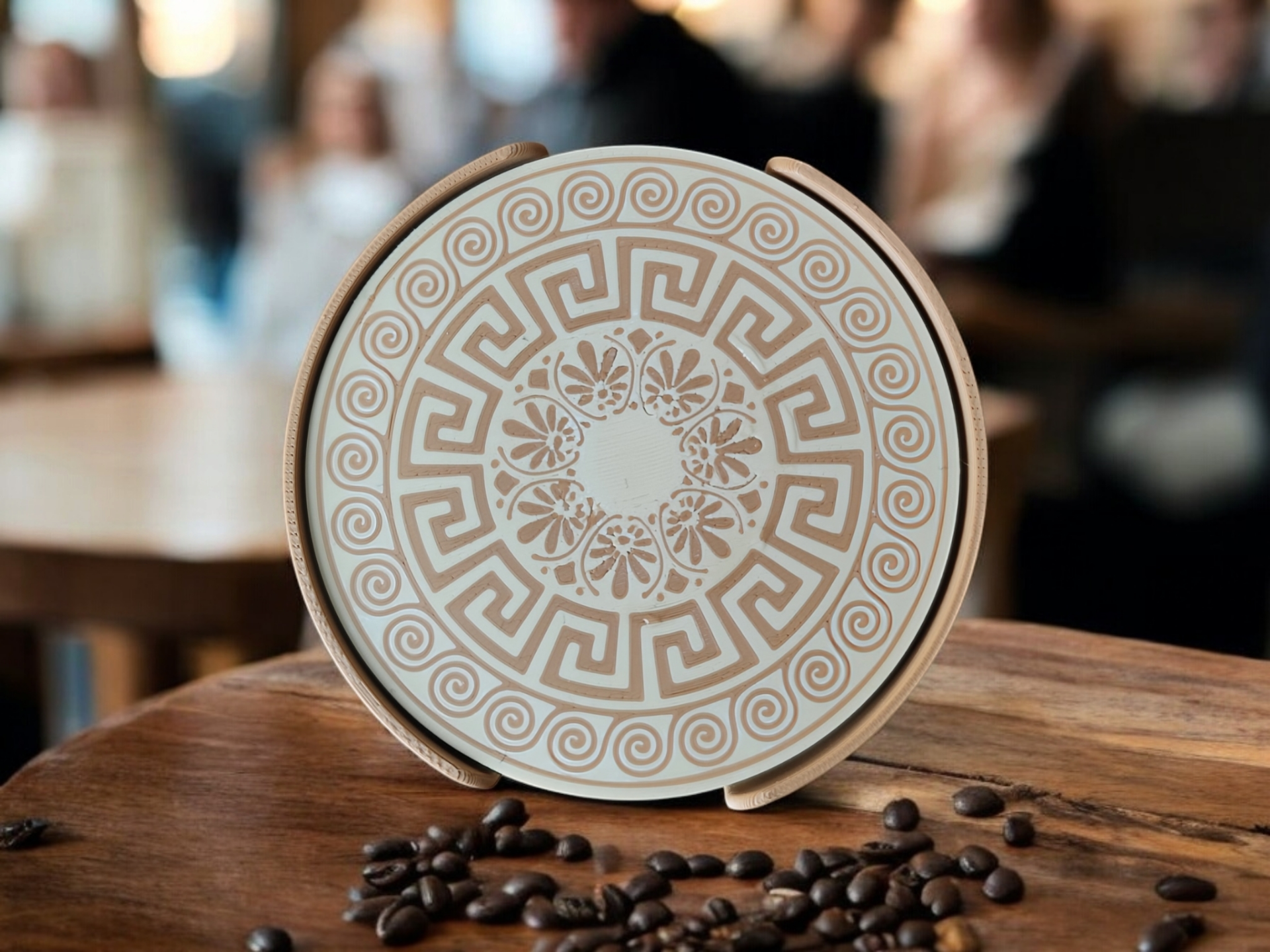 Close-up of Greek ornamental pattern on single coaster with multicolored geometric design