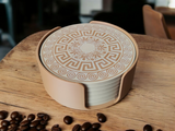 Close-up of Greek ornamental pattern on single coaster with multicolored geometric design
