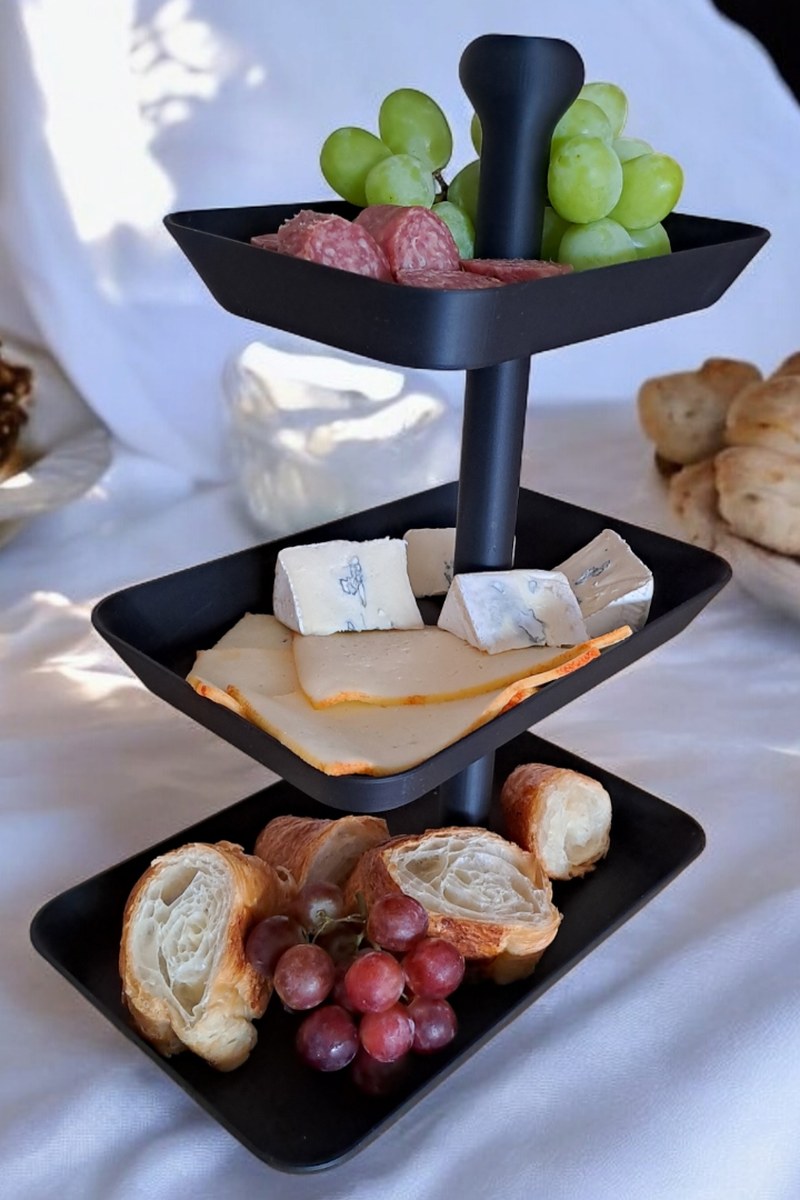 Three tier rectangular serving tray with stacked platforms in white