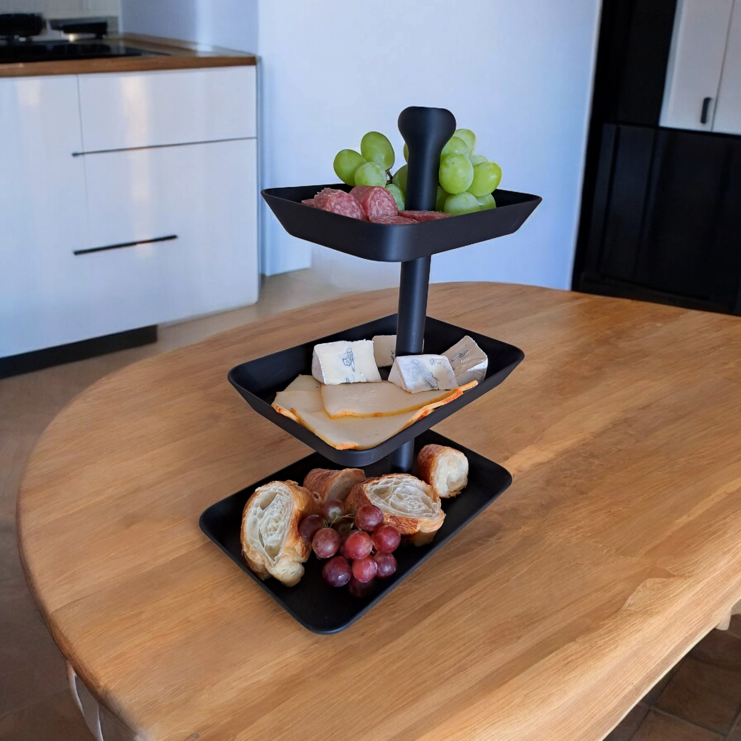 Three tier rectangular serving tray with stacked platforms in white