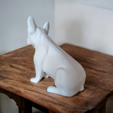 Minimalist french bulldog sculpture in profile, showing realistic proportions and clean lines