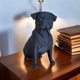 Minimalist pug sculpture displayed on shelf with books and plants