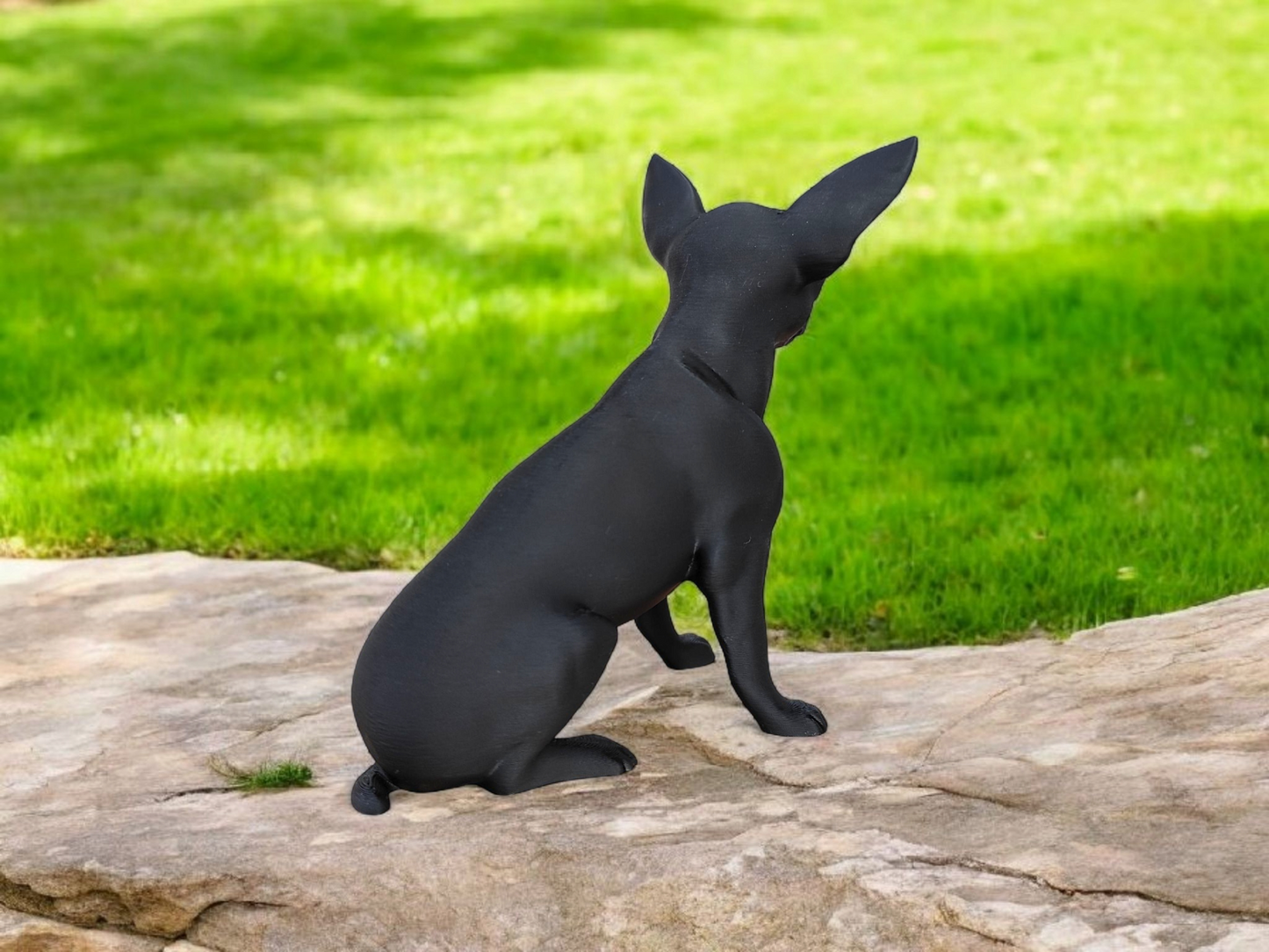 Detail view of chihuahua statue surface texture and refined form