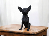 Close-up of minimalist chihuahua sculpture showing clean profile and alert posture