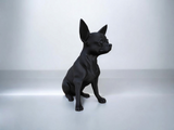 Close-up of minimalist chihuahua sculpture showing clean profile and alert posture