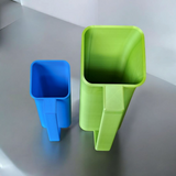 Modern curved pet food scoop with rounded bowl and handle detail
