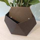 Detail of smooth spherical form and slim mounting profile of plant pot