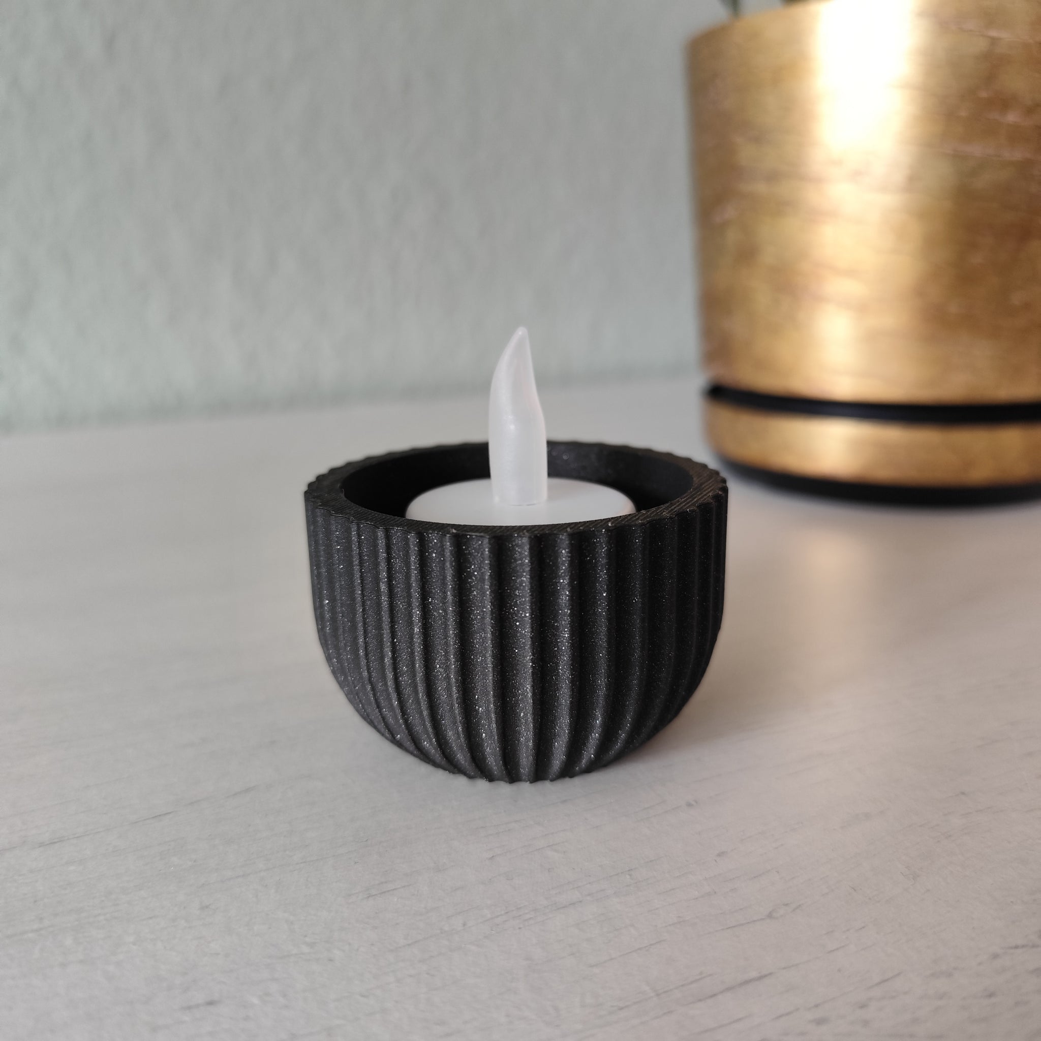Detail of ribbed pattern on minimalist tealight holder