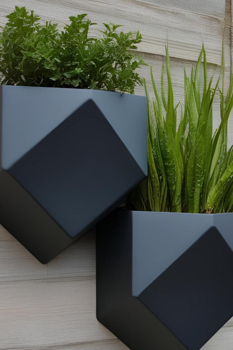 Close-up of low poly wall planter showing geometric faceted surface