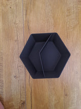 Detail view of minimalist bowl's smooth matte finish and subtle hexagonal edge structure
