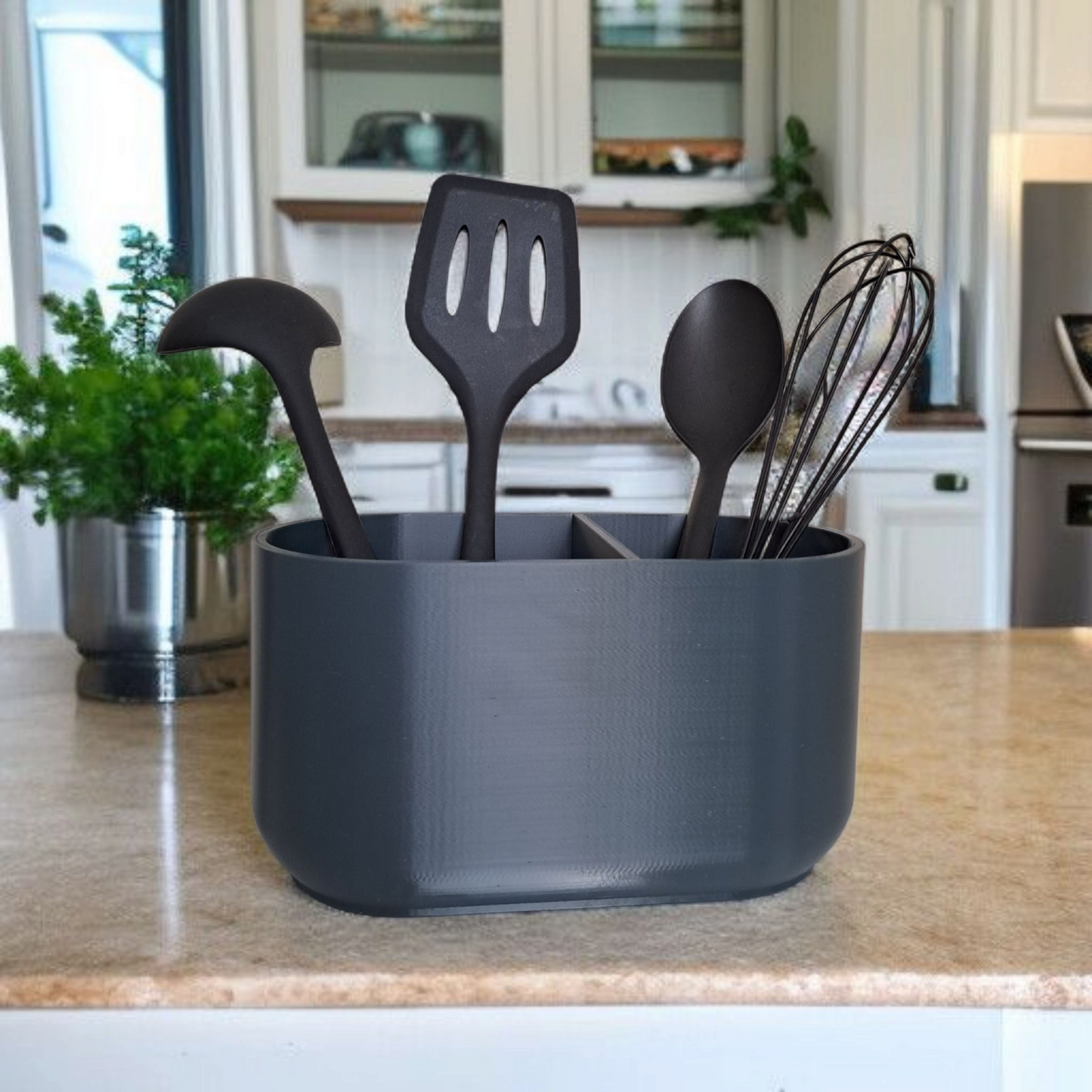 Close-up detail of two-compartment kitchen utensil holder design