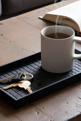 Bricked key tray with textured base in light finish