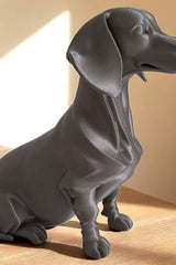 Minimalist dachshund sculpture with clean geometric form, side view