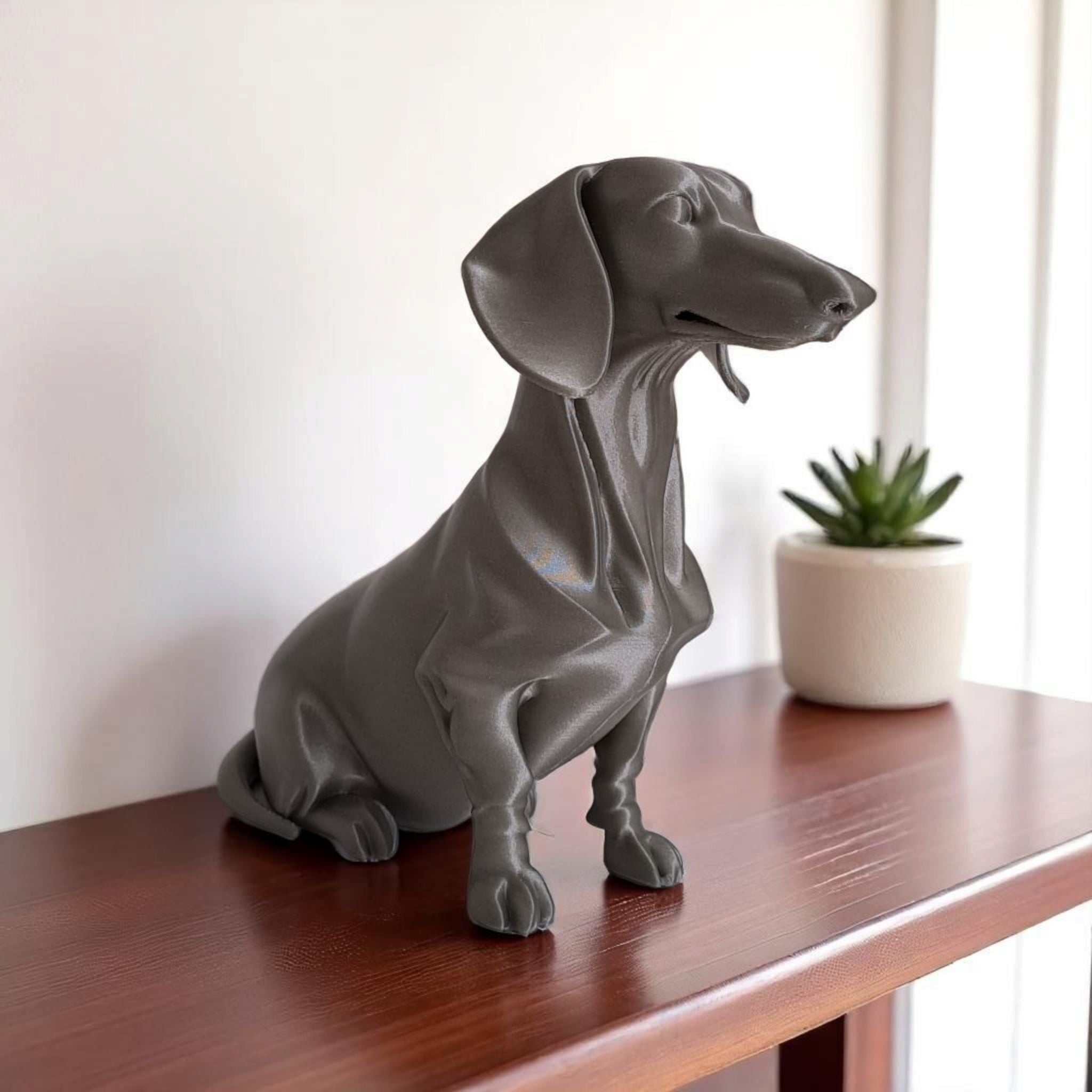 White minimalist dachshund figure displayed on a wooden shelf