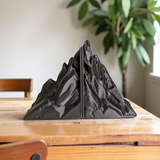 Side profile of minimalist bookend showing clean angular silhouette