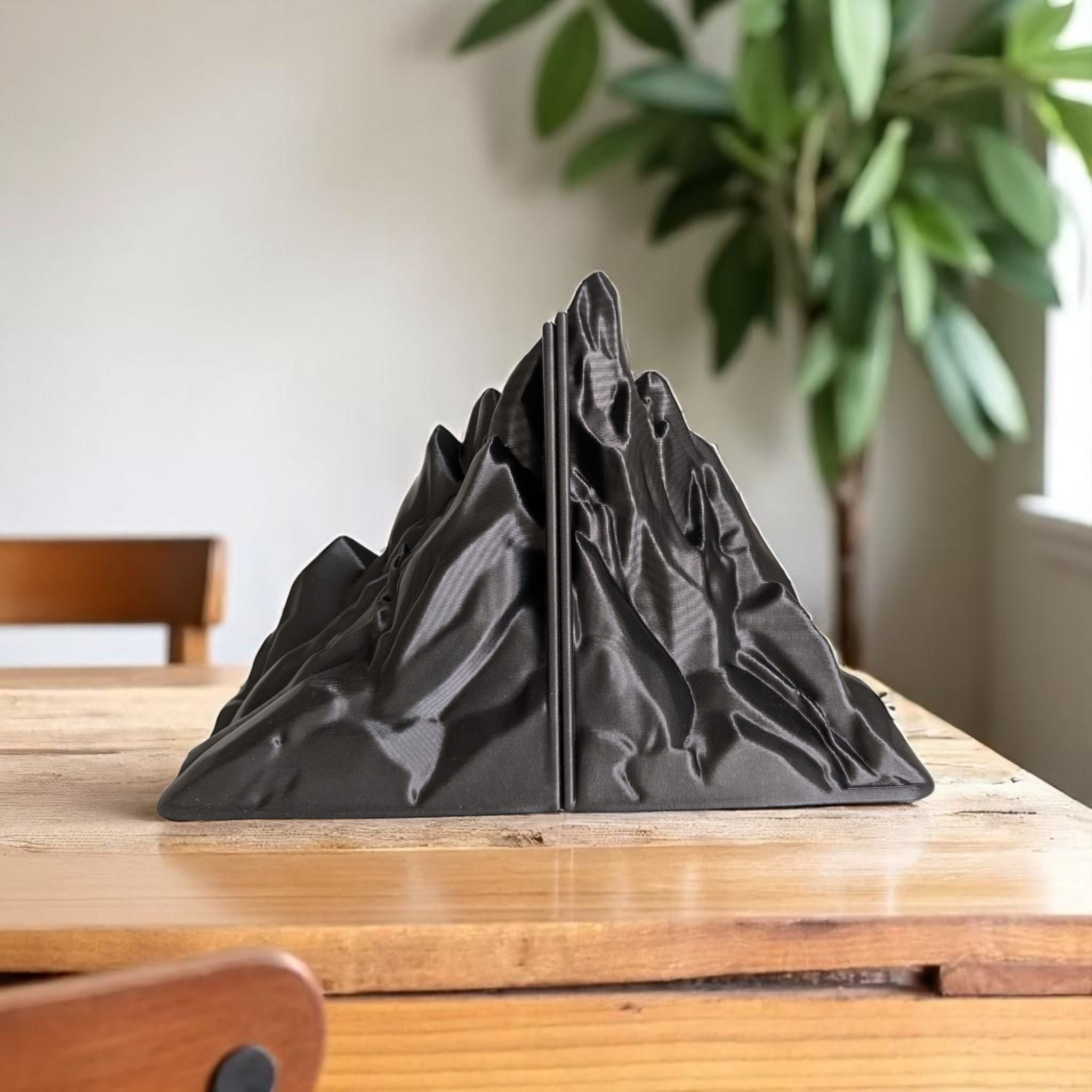 Side profile of minimalist bookend showing clean angular silhouette