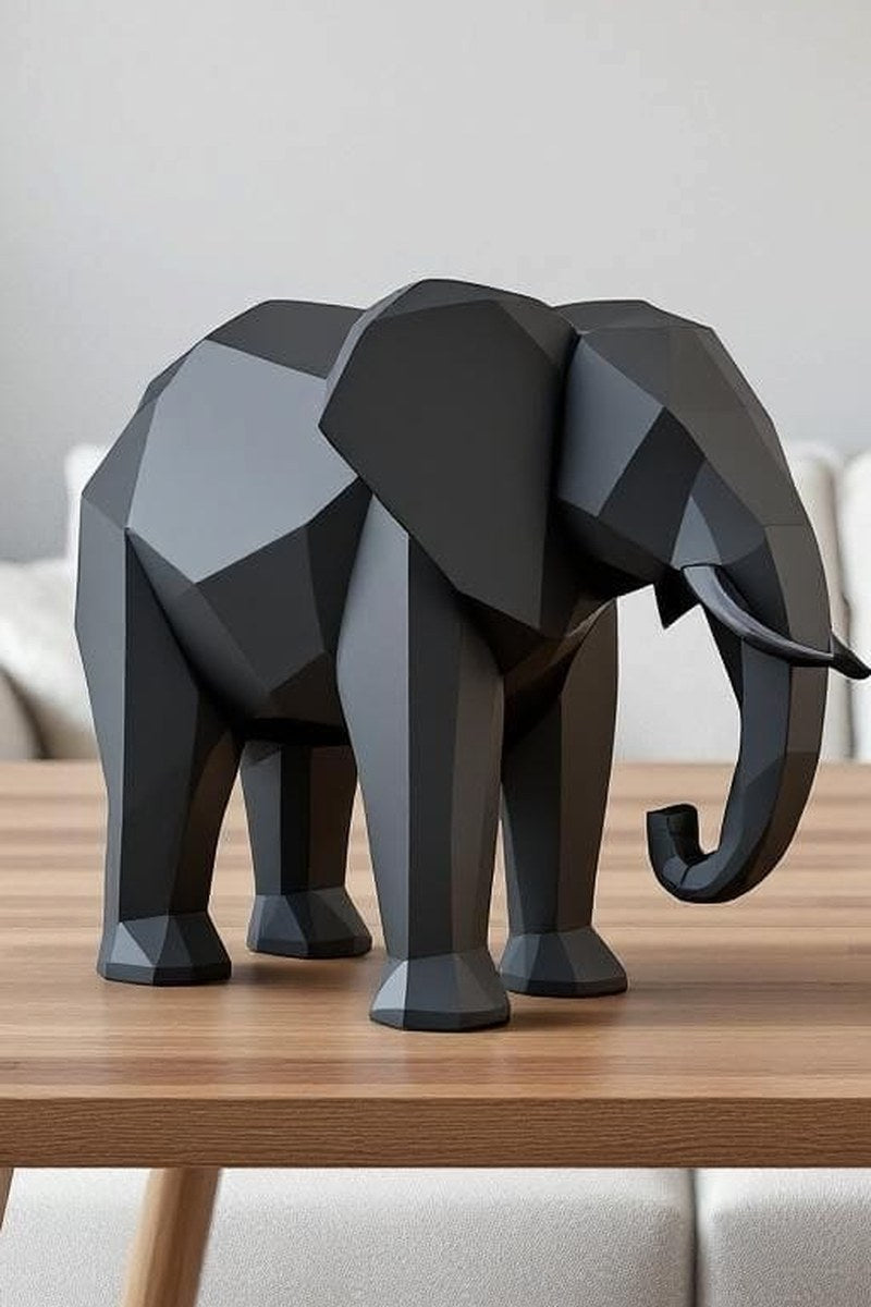 Close-up of low poly elephant sculpture showing geometric facets and matte finish