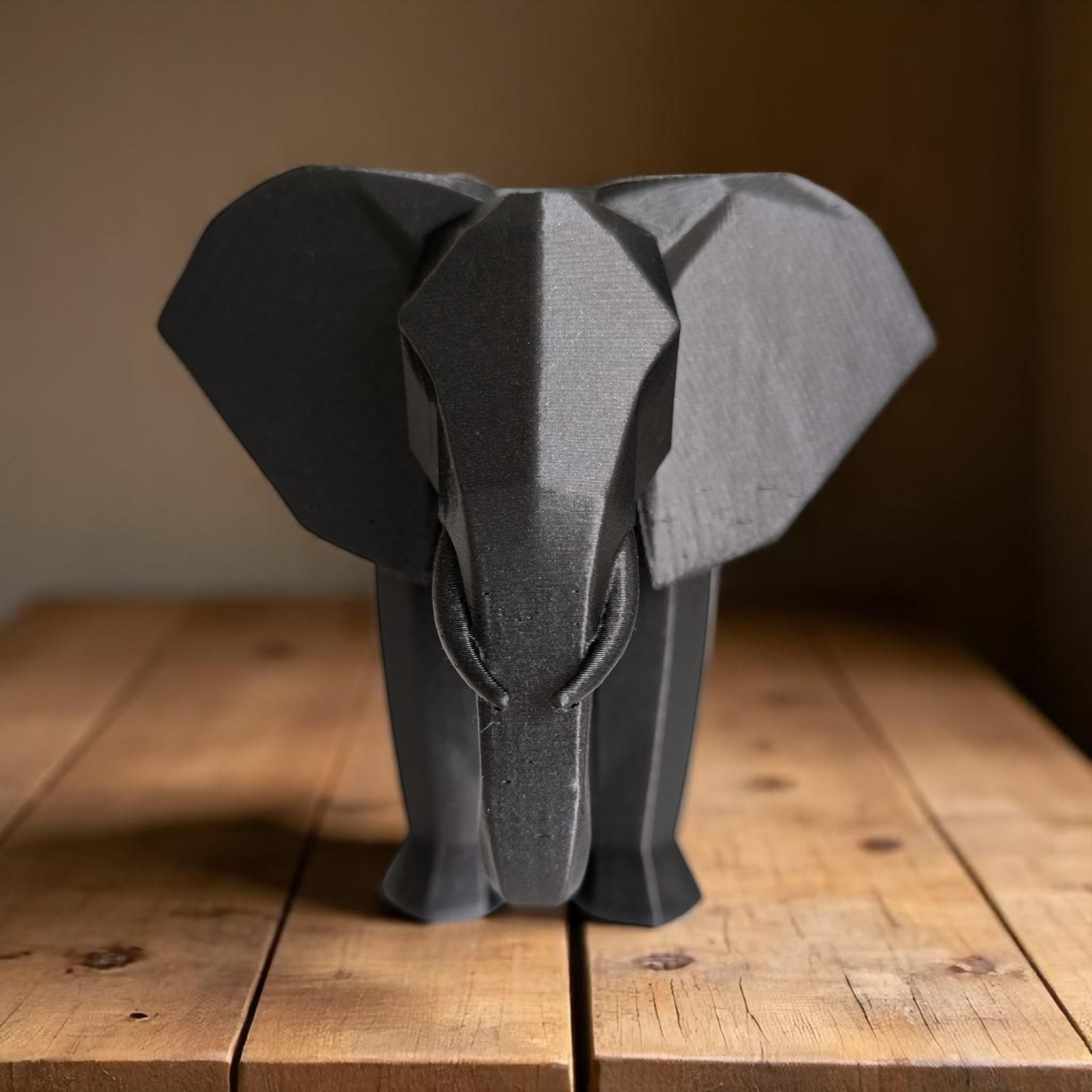 Detail of the angular trunk and ear segments of the minimalist elephant design