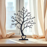 Minimalist tree decor silhouette viewed from the front, showing clean branch lines