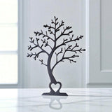Minimalist tree decor silhouette viewed from the front, showing clean branch lines