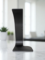 Swing headphone stand viewed from the side, showing curved cantilever arm and stable base