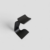 Swing headphone stand viewed from the side, showing curved cantilever arm and stable base