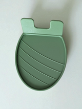 Detail shot of the textured base of the spoon rest showing the weighted design