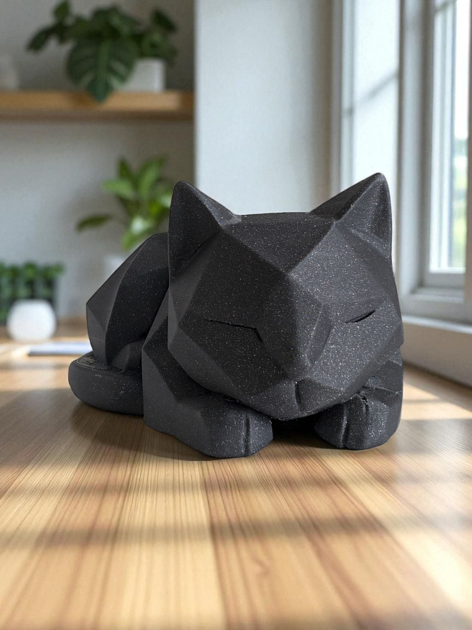 Close-up of low poly cat figurine showing geometric plane details