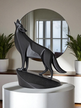 Close-up of minimalist wolf sculpture showing geometric planes and open mouth detail