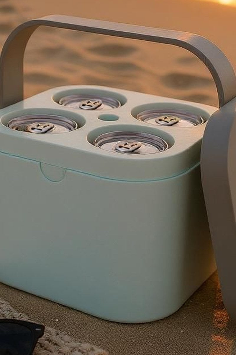 Freezable cooler cube with four separate compartments for cans, viewed from above