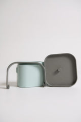 Freezable cooler cube with four separate compartments for cans, viewed from above