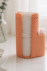 Close-up of ribbed cotton pad organizer showing dual compartments and textured walls