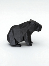 Low poly capybara sculpture showing geometric faceted surface and calm posture