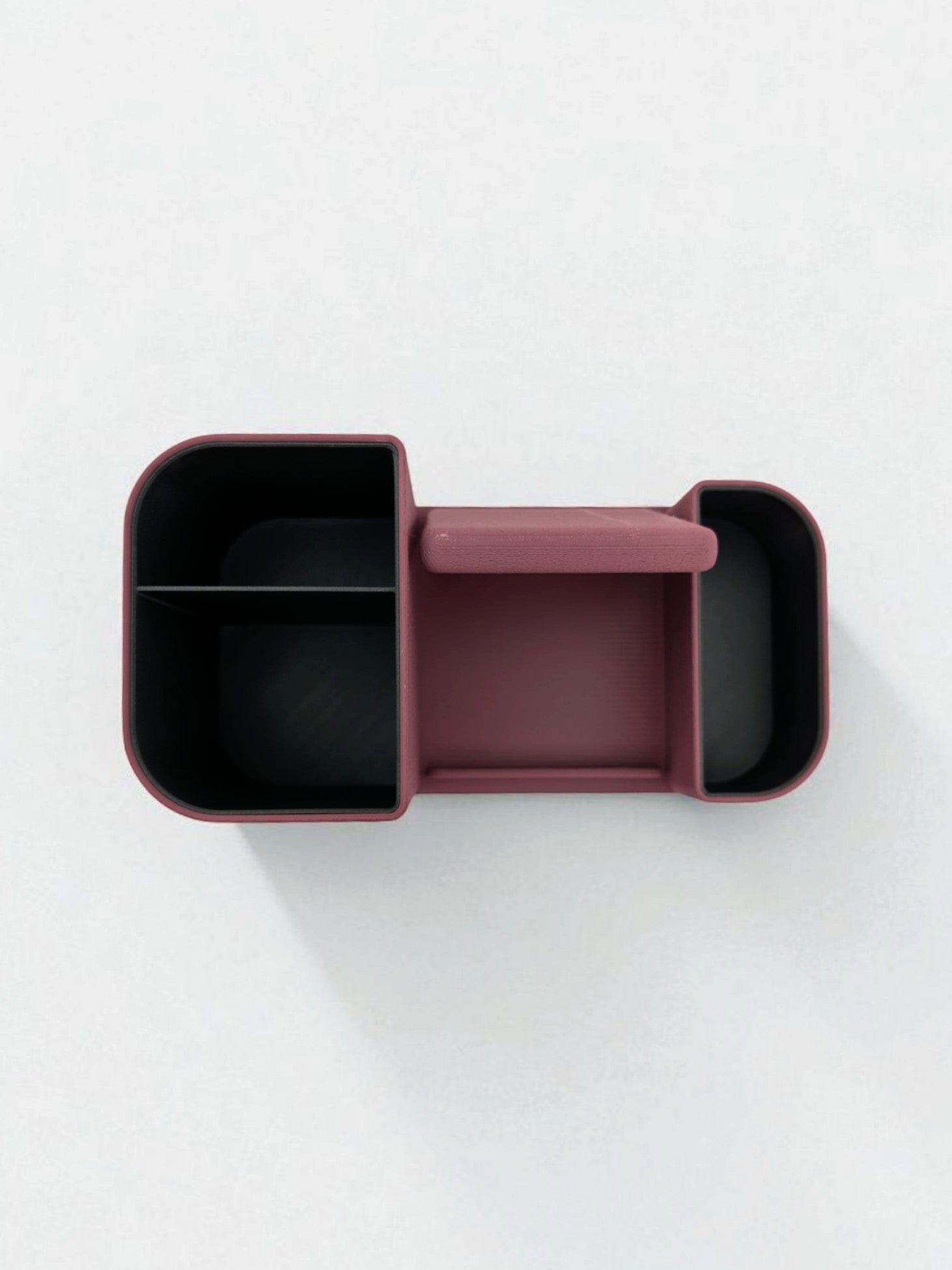 Desk organizer with phone holder showing dual-color design and textured surface
