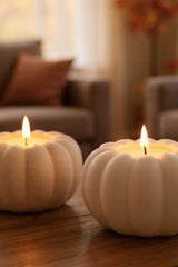 Pumpkin tealight holder in cream, close-up showing smooth surface