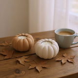 Detail of pumpkin tealight holder texture with warm lighting