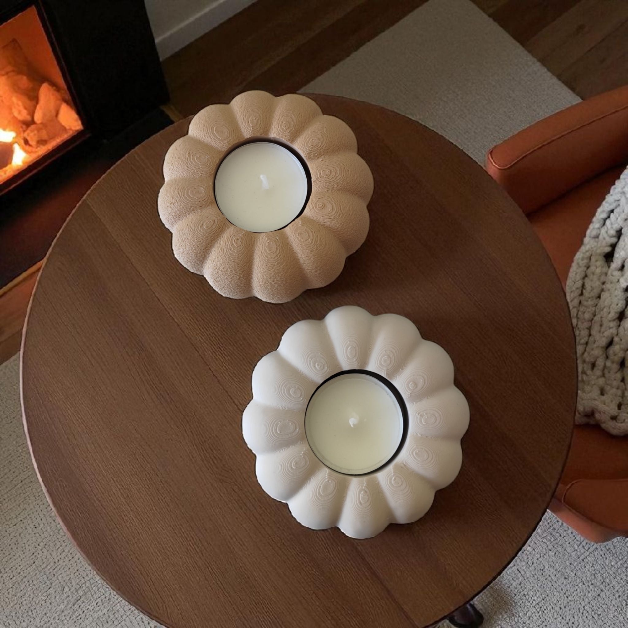 Pumpkin tealight holder in cream, close-up showing smooth surface